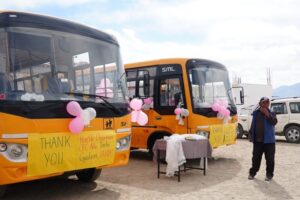 LAHDC Leh Enhances Education Access in Ladakh with Bus Donations to LBA Schools